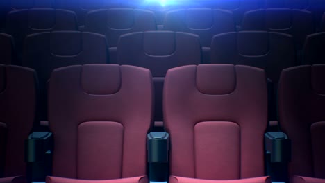 moving along empty cinema chairs with the back light seamless. looped 3d animation of rows of red seats in cinema hall. art and media concept.