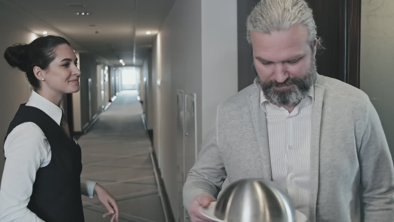 Businessman Ordering Meal in Hotel Room