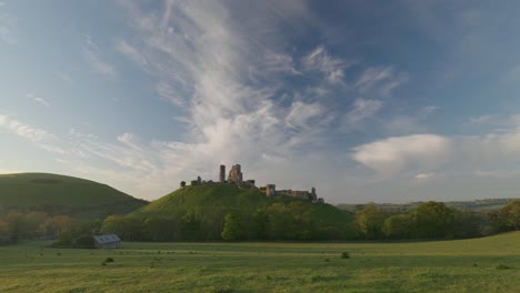 dramatic shot of corfe castle and surrounding english countryside