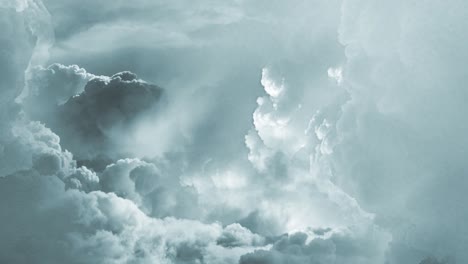 thick white cumulonimbus clouds with a thunderstorm around them