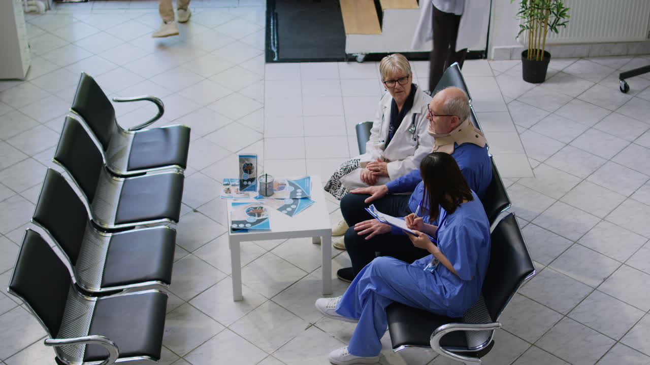 Hospital Waiting Room Scene with Medical Staff and Patient