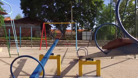 empty park for children two seesaws in front