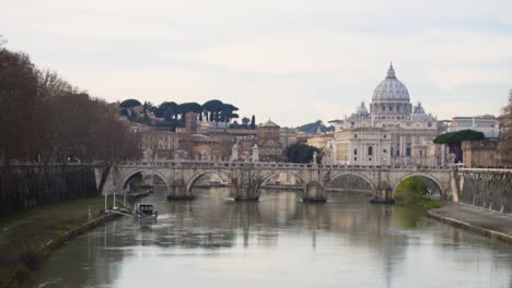 st. peter's basilica and tiber river in rome, italy