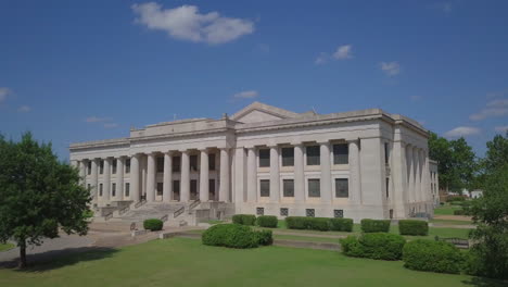 Aerial-shot-of-white-house-in-the-blue-sky