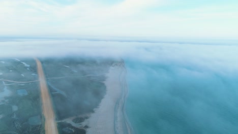 misty coastal landscape from above