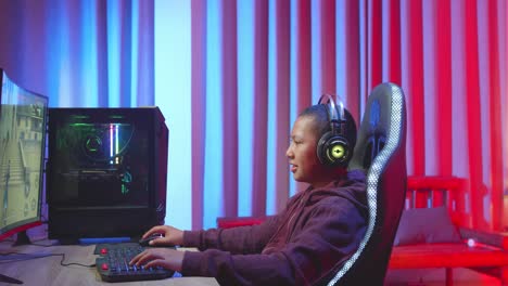 teen gamer playing video games