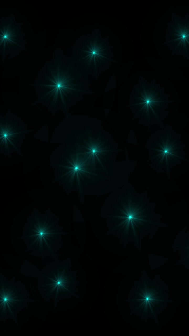 Twinkling blue Christmas fairy lights glowing softly in dark space on black background