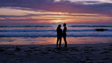 couple at sunset on the beach
