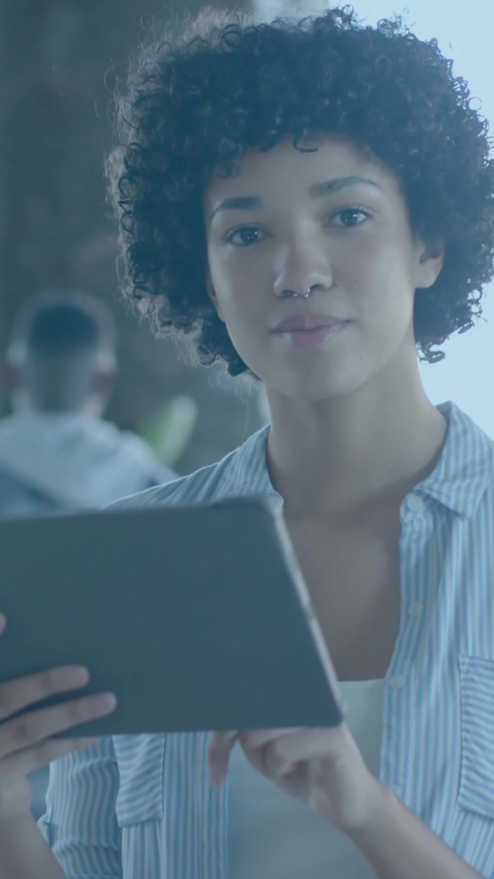 Animation of ai chat over businesswoman using tablet in office