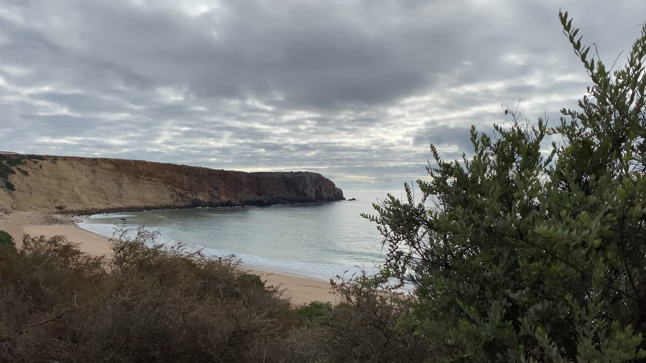 western cliffs of Sagres meet the restless Atlantic, where land and sea merge in wild harmony