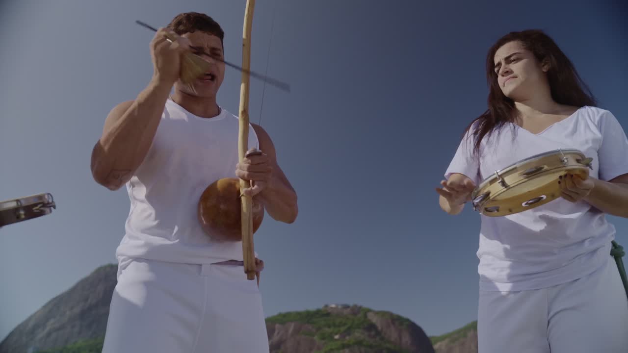 Brazilian Capoeira Musicians Playing Traditional Instruments