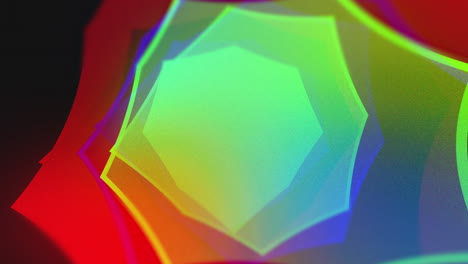 multicolour 4k looping gradient background with subtle movement and black background. red green and blue multi-sided shapes ebbing and moving like water.