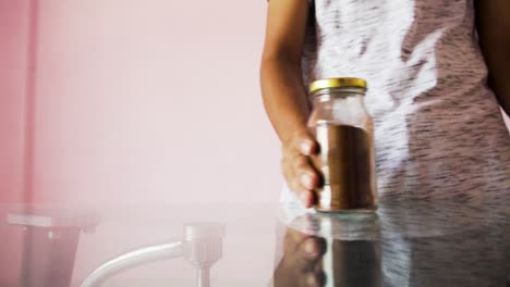 Young-Man-making-coffee-with-coffee-powder