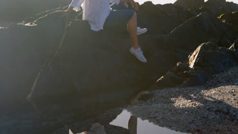 disabled woman relaxing on the rock 4k