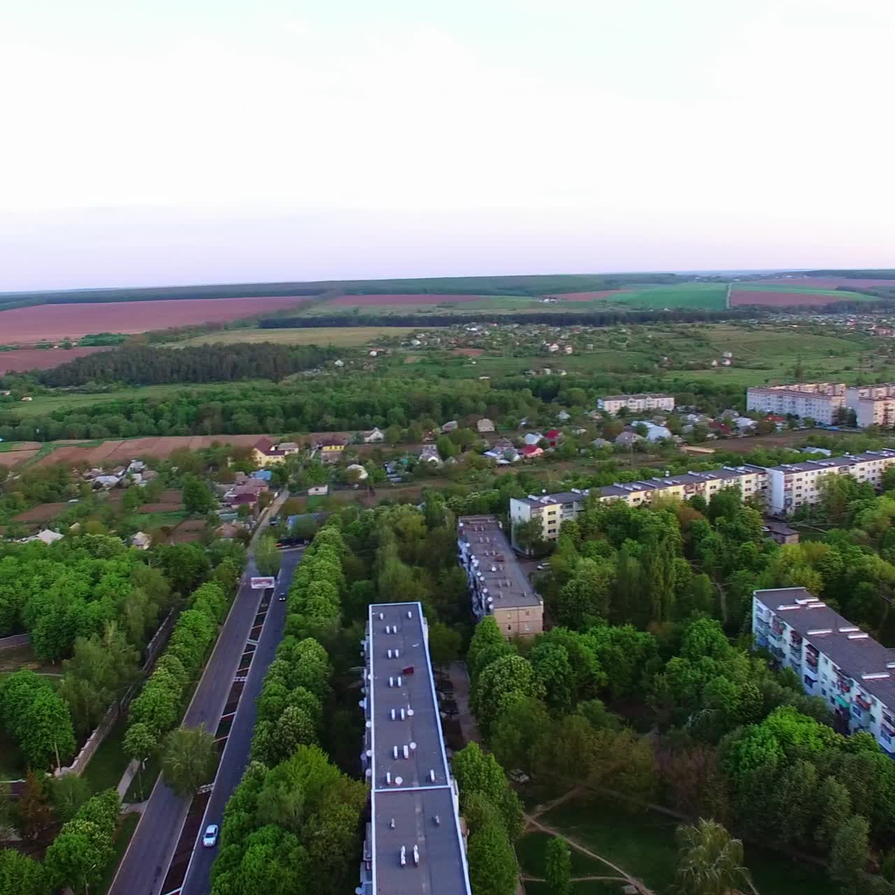 Amazing green city of Ukraine. Circle movement around the blocks of flats in the residential area. Aerial view