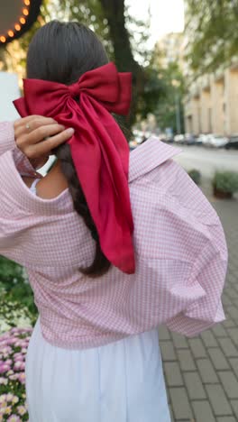 woman in pink plaid shirt