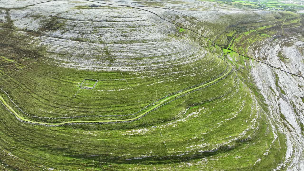 Ireland Epic Locations drone flying over the layered landscape of the Burren Clare limestone micro climate on the Wild Atlantic way Ireland