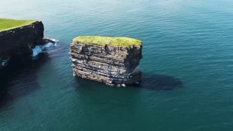 Drone-shot-flying-up-above-Downpatrick-Head