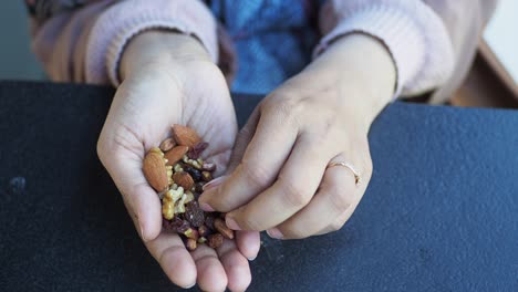 mixed nuts in hands