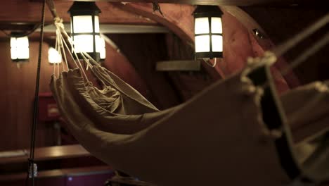 Close-up-of-old-warships-hammock-below-decks