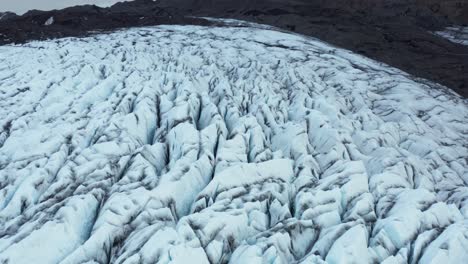 endangered retreating falljökull glacier in iceland, jagged surface, aerial