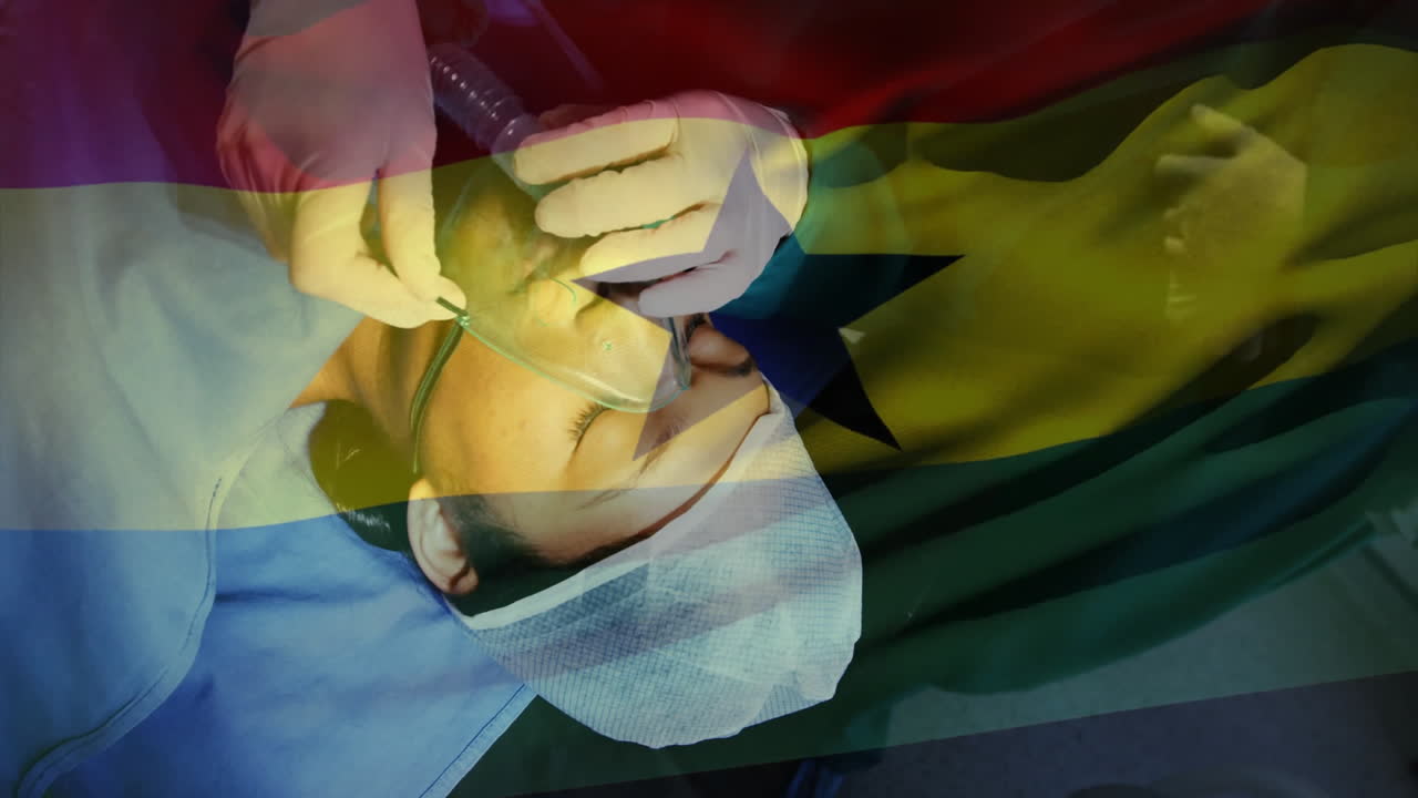 Animation of flag of ghana over biracial female patient with oxygen mask during surgery