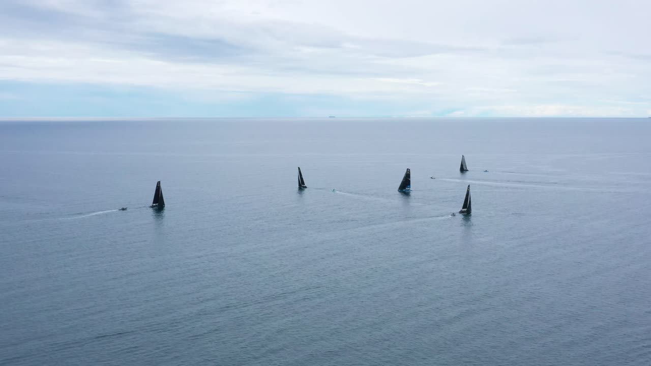 Race Sailboats sailing in Regatta RC44 Rovinj Croatia - Aerial Drone View