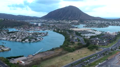 Hyperlapse-of-Hawaii-Kai-marina,-epic-clouds-surrounding-koko-head