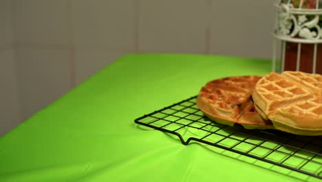 Panning-shot-of-waffles-in-breakfast-table-slow-motion