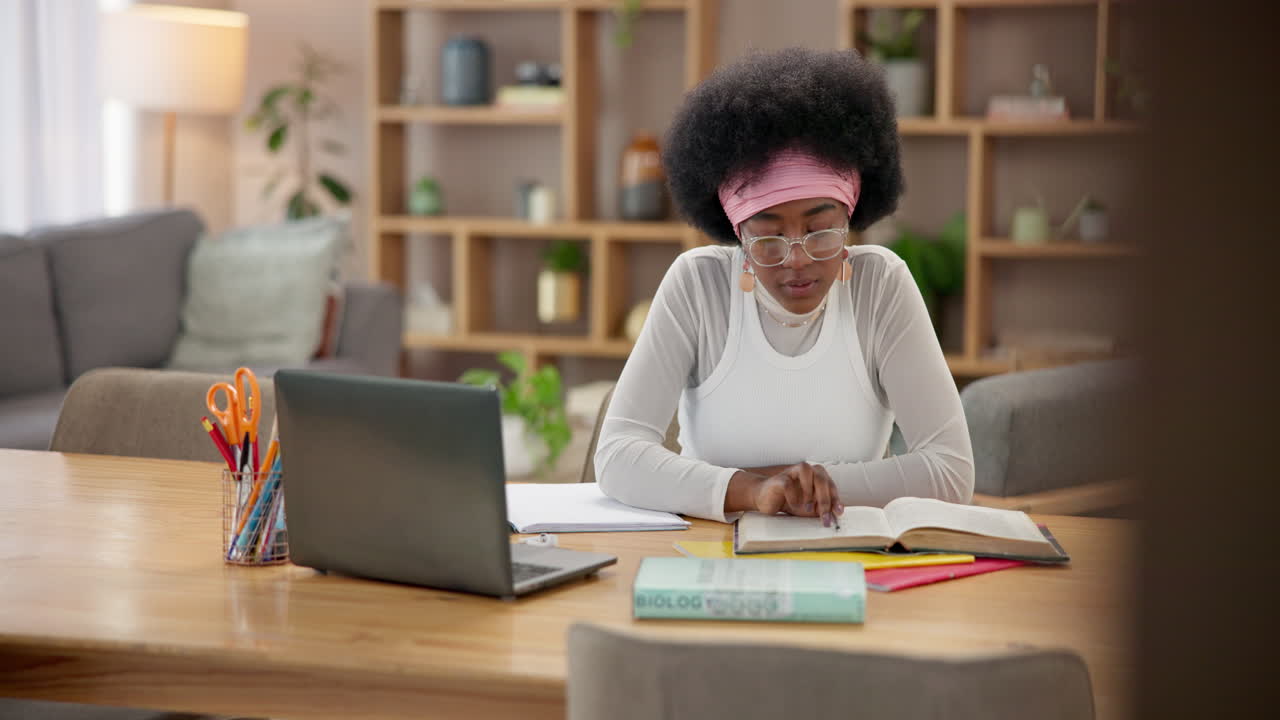 Young woman studying at home