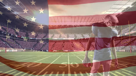 american football player preparing to shoot ball with american flag