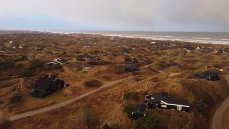 aerial view houses on coastal seafront beach