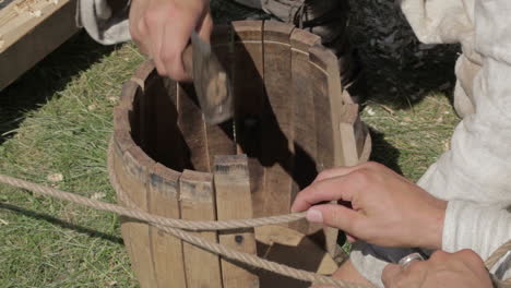 man making barrell