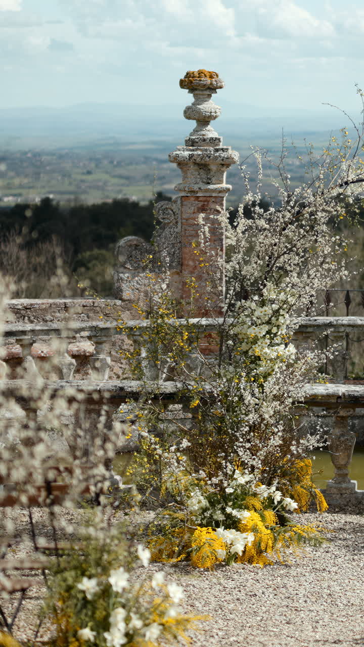 Balcony with Flowers and Ornate Stone Architecture