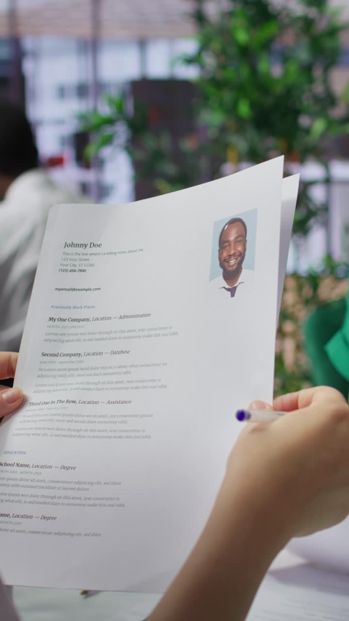 Vertical Video HR employers analyzing candidate CV after the job interview