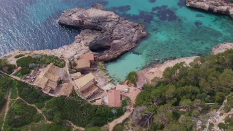 Aerial-view-of-S'Almonia-cove-at-Mallorca-with-cristal-clear-water-during-day-time