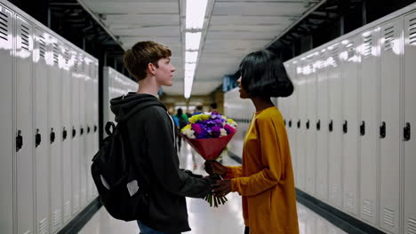 high school students exchange flowers