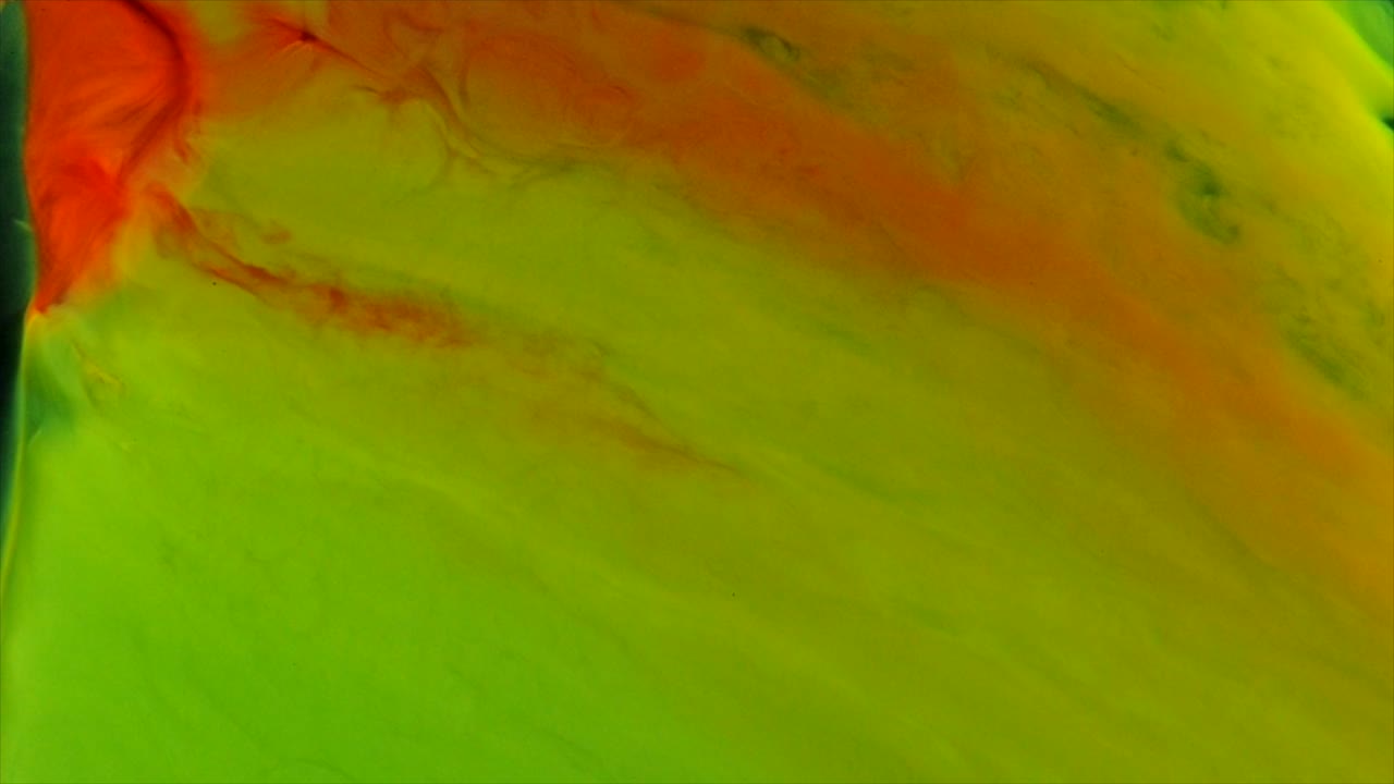 Da un arancione brillante fiumi scorrono in un mare giallo-verde.