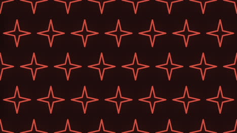 Symmetrical-red-star-pattern-on-dark-background