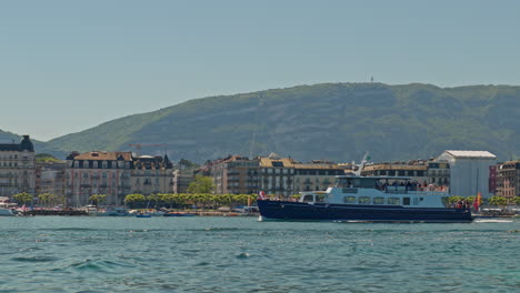 peaceful morning in geneva with the iconic jet d’eau rising from the lake, calm waters reflecting the clear sky, and the city slowly coming to life in the morning light.
