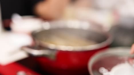 preparing hotpot with friends in bangkok kitchen