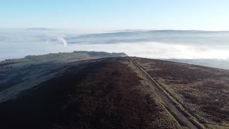 cloudy misty sunrise valley aerial moorland hiking hillside muddy path lancashire forward left orbit