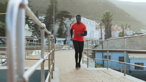 black man, running in city with exercise