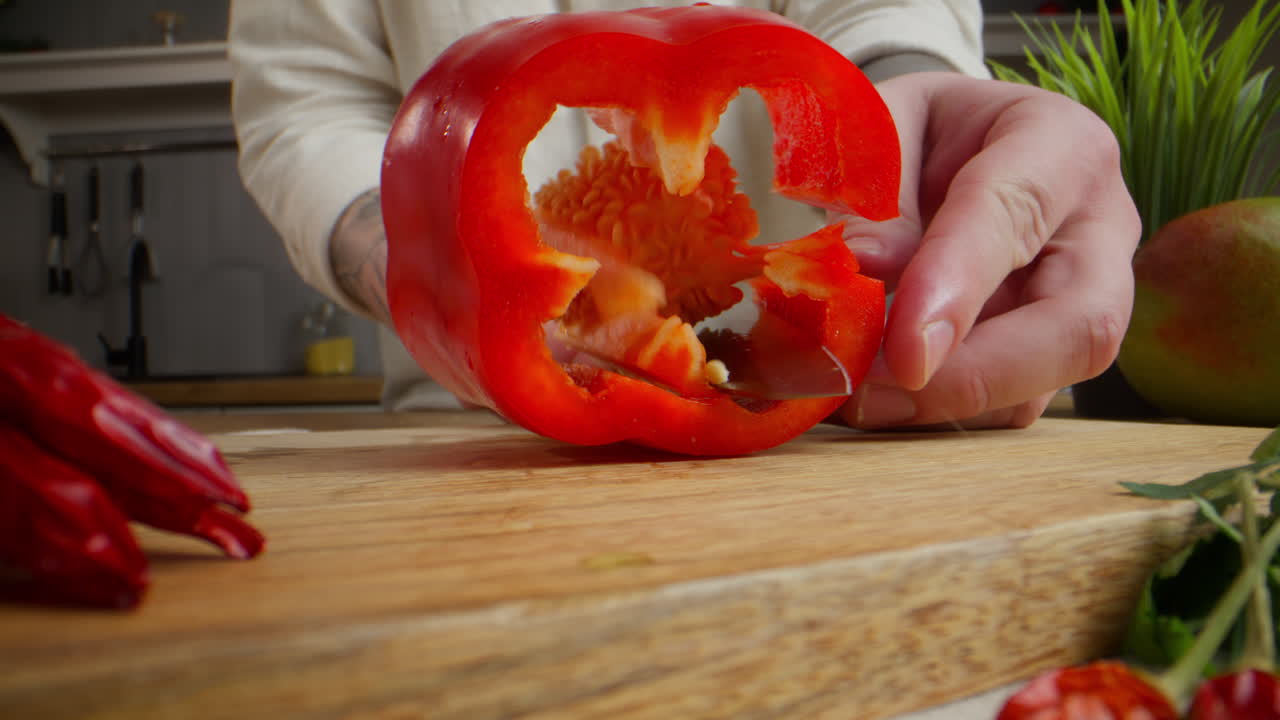 Chef preparing red bell pepper