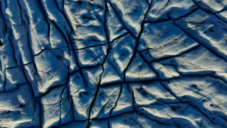 Top-View-Of-Carvasses-In-Skaftafellsjokull-Glacier-Outlet-In-South-Iceland---Drone-Shot