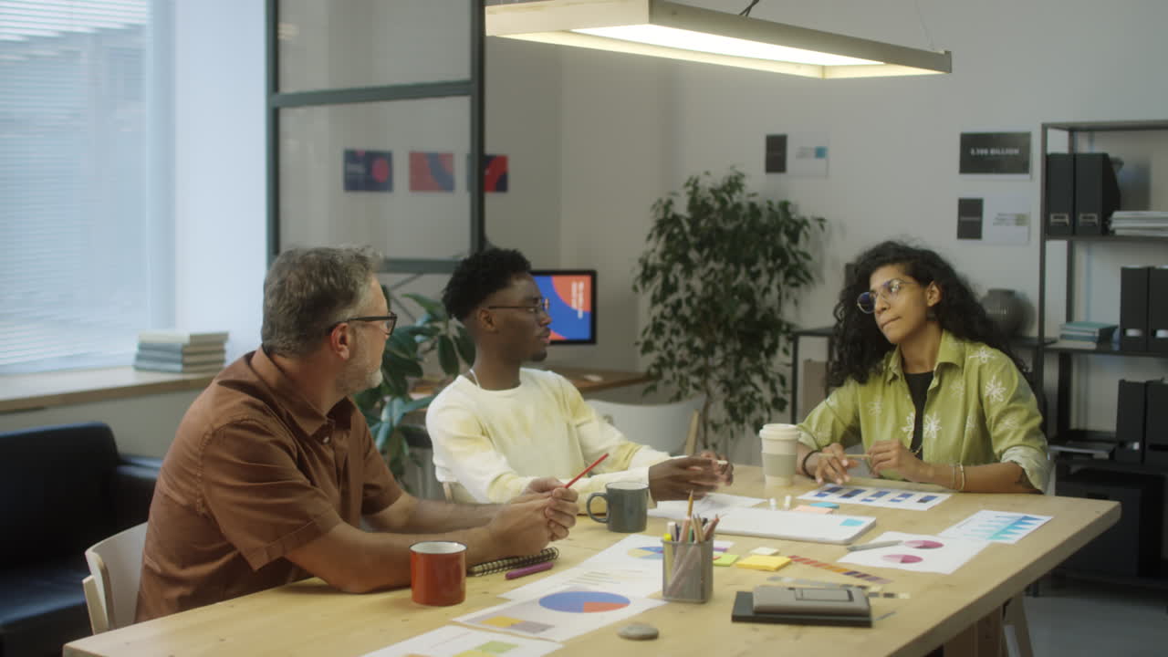 Team Discussing Business Ideas in Office