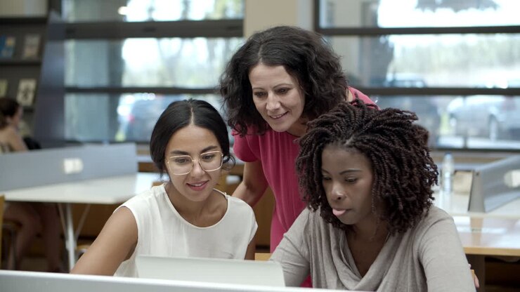 Front view of mature students discussing new project