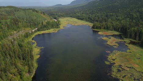 Seeley-Lake-Provincial-Park-Aerial-Views-with-an-Pull-Out-Dolly-Shot-Across-the-Water-in-Smithers,-Canada