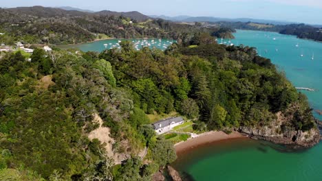 aerial look up reveal small bay with anchored boats, sunny day