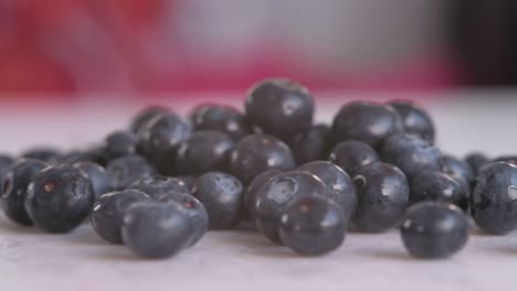 close on blueberries poured onto chopping board